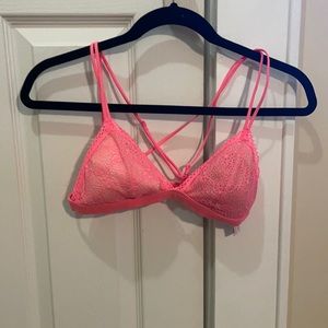 Womens neon link bralette with nude lade backdrop